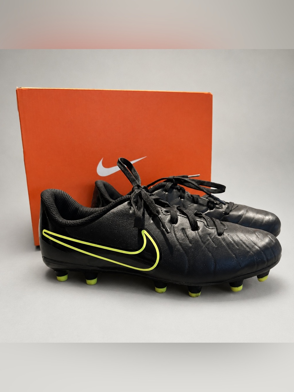 Nike Youth Black Soccer Cleats with Neon Yellow Swoosh